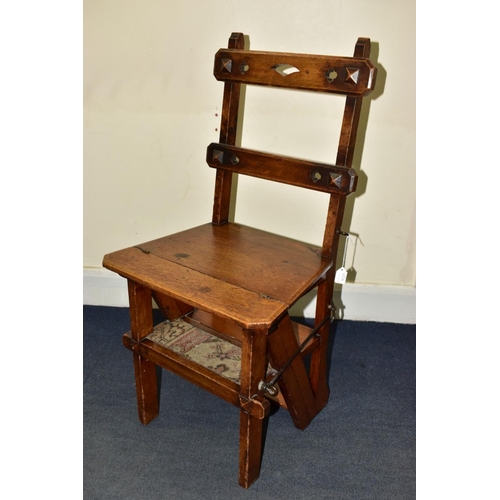 455A - A VICTORIAN OAK GOTHIC STYLE METAMORPHIC CHAIR/LIBRARY STEPS, with quatrefoils to the bar back, and ... 