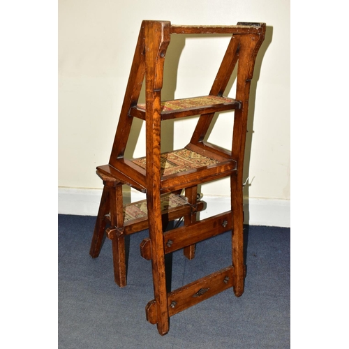 455A - A VICTORIAN OAK GOTHIC STYLE METAMORPHIC CHAIR/LIBRARY STEPS, with quatrefoils to the bar back, and ... 