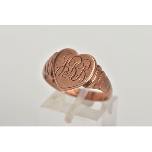 50 - A 9CT ROSE GOLD SIGNET RING, in the form of a heart with engraved initials, textured shoulders leadi... 