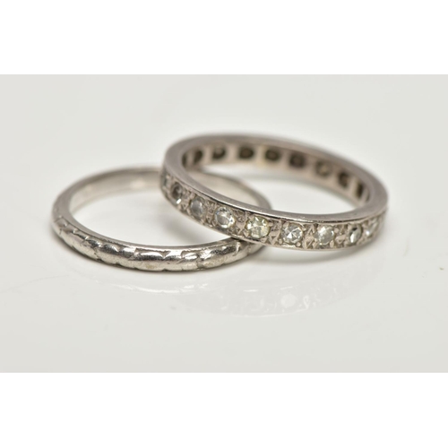 57 - A WHITE METAL SINGLE CUT DIAMOND FULL ETERNITY RING AND A WHITE METAL FOLIATE BAND RING, the first e... 