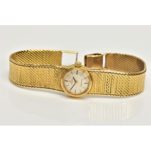 67 - A LADIES 9CT GOLD 'OMEGA' WRISTWATCH, a hand wound movement, round silver tone dial signed 'Omega La... 