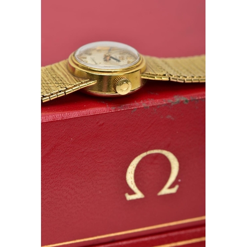 67 - A LADIES 9CT GOLD 'OMEGA' WRISTWATCH, a hand wound movement, round silver tone dial signed 'Omega La... 