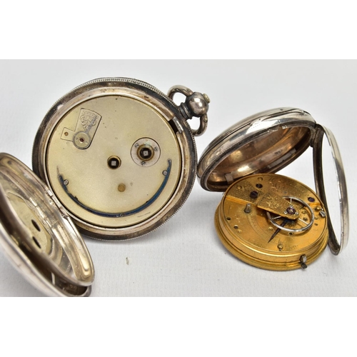 70 - TWO SILVER POCKET WATCHES, the first with an open face, circular white dial, Roman numerals, subsidi... 