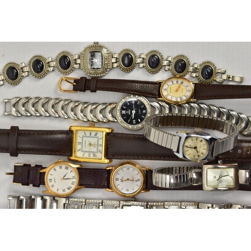 83 - A TIN OF ASSORTED WRISTWATCHES, mostly quartz movements, to include ladies and gents watches with na... 