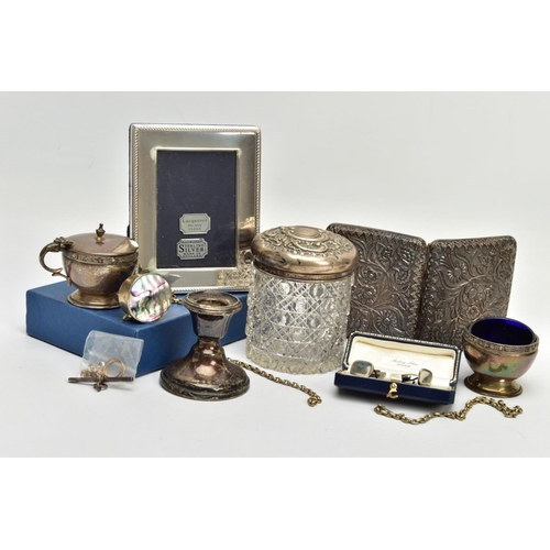 86 - A SELECTION OF SILVER AND WHITE METAL ITEMS, to include a cut glass and silver embossed lidded vanit... 