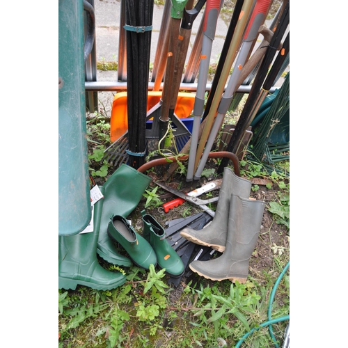 1201 - A SELECTION OF GARDEN TOOLS, to include two spades, one shovel, a rake, axe, show plough, plastic wh... 