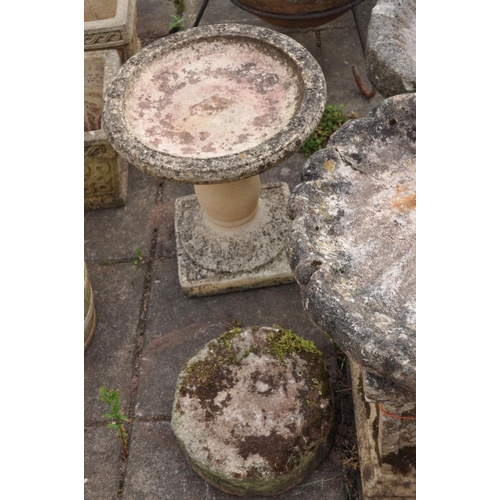 1205 - A COMPOSITE SHELL SHAPED BIRD BATH, on a separate spiralling base, height 76cm (condition:-missing b... 