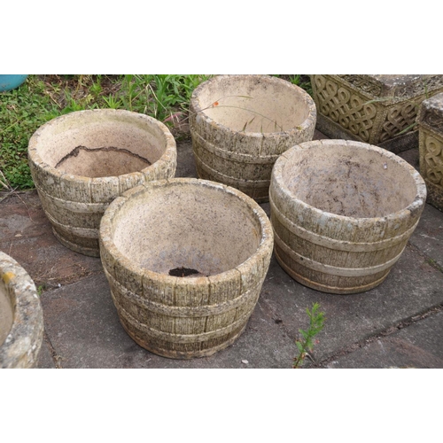 1207 - A SET OF FOUR COMPOSITE BARREL TYPE CIRCULAR PLANTERS, diameter 30cm x height 21cm, along with a pai... 