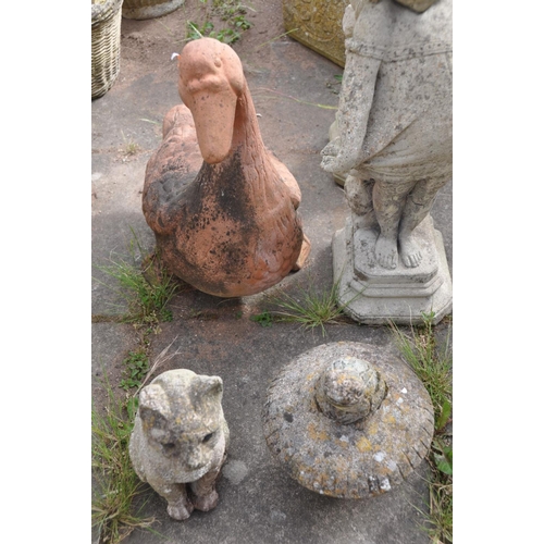 1209 - A SELECTION OF COMPOSITE GARDEN FIGURES, to include a standing semi clad female (some losses and cra... 