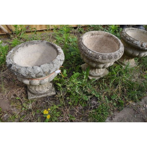 1211 - SET OF FIVE SMALL COMPOSITE CAMPAGNA GARDEN URNS, on separate square plinths, diameter 38cm x height... 