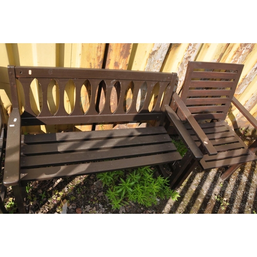 1216 - TWO VARIOUS STAINED WOOD GARDEN BENCHES, max length 159cm, an armchair and a slatted coffee table (4... 