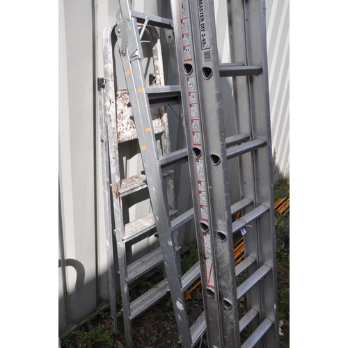 1218 - AN ALUMINIUM DOUBLE EXTENTION LADDER, and two aluminium step ladders (3)