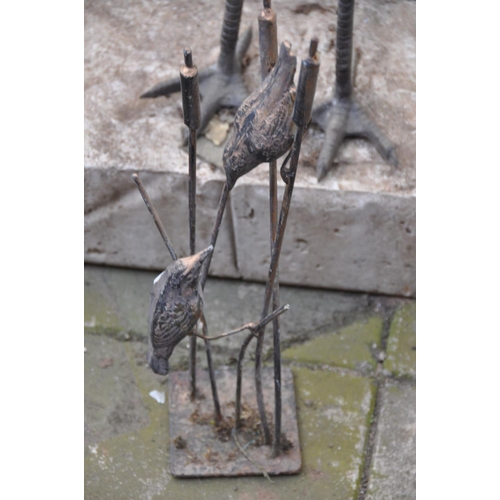 1221 - A PAIR OF METAL JAPANESE CRANE FIGURES, both figures with their necks in different positions, on a c... 