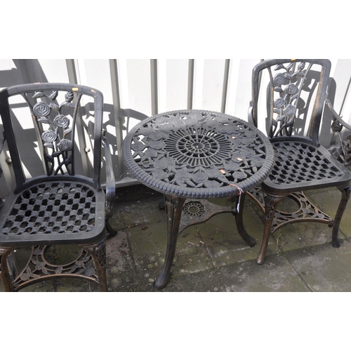 1223 - A PLASTIC CIRCULAR GARDEN TABLE, diameter 68cm x height 65cm and two armchairs, along with three var... 