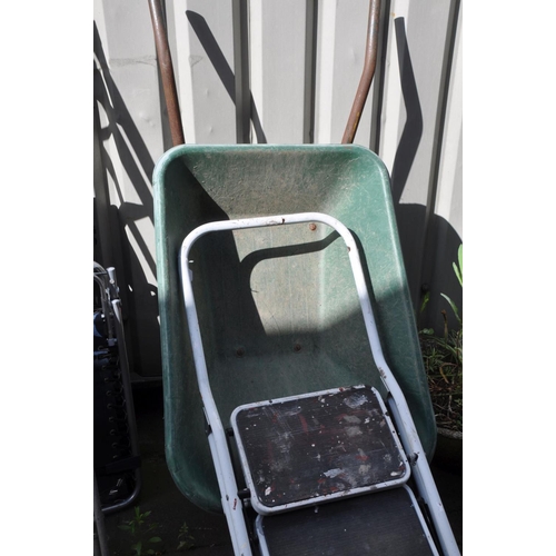 1228 - TWO FOLDING GARDEN LOUNGER CHAIRS, along with a plastic wheelbarrow, and two metal ladders (5)