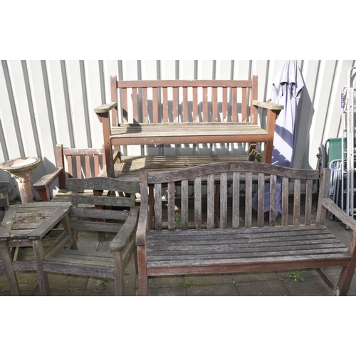 1229 - A MATCHED WEATHER TEAK GARDEN SET, including a garden table, 150cm x depth 79cm x height 72cm, a ben... 