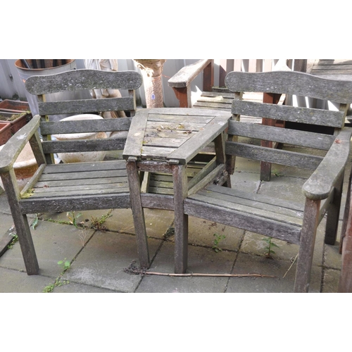 1229 - A MATCHED WEATHER TEAK GARDEN SET, including a garden table, 150cm x depth 79cm x height 72cm, a ben... 