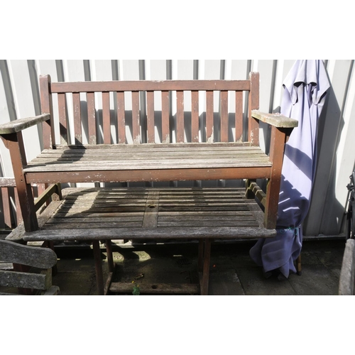 1229 - A MATCHED WEATHER TEAK GARDEN SET, including a garden table, 150cm x depth 79cm x height 72cm, a ben... 