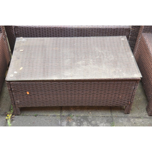 1235 - A RATTAN EFFECT GARDEN SET, comprising a two seater bench, pair of armchairs and a coffee table with... 