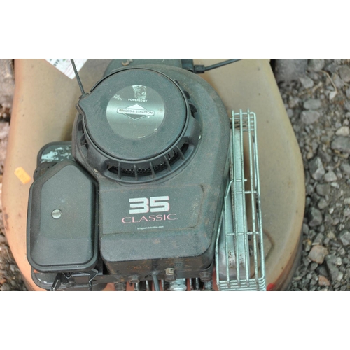 1240 - A BRIGGS AND STRATTON PETROL LAWNMOWER, with grass box (engine not turning)