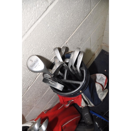 1284 - TWO GOLF BAGS CONTAINING CLUBS to include a Wilson golf bag with a set of Apollo clubs, a Karobes go... 