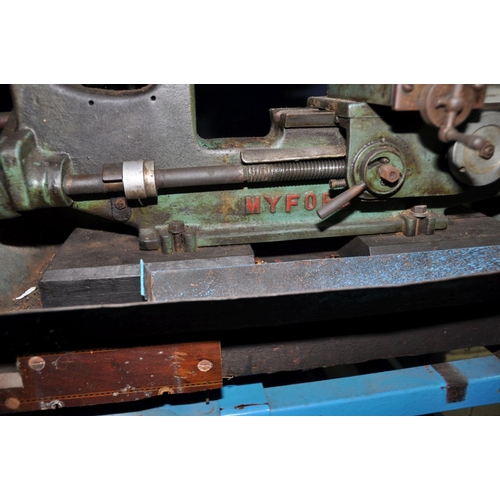 1303 - A VINTAGE MYFORD METAL WORKING LATHE with a 17in bed, belt drive by motor on separate frame, fitted ... 