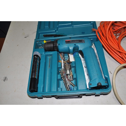 1309 - A STANDARD ELECTRICAL 110V TRANSFORMER, a Makita 6095D 9.6v drill driver with 110v charger and three... 