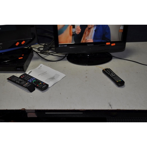 1312 - A SAMSUNG LE19R71B 19in Analogue TV with remote, a Panasonic HDD player with remote and a Technika 1... 