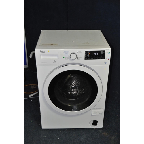 1320 - A BEKO WDR7543121W washing machine/dryer (PAT pass and powers up)