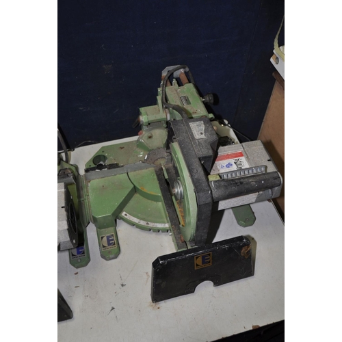 1338 - TWO ELECTRA BECKUM KGS300 sliding cross cut mitre saws (no blades and side panel loose and missing s... 