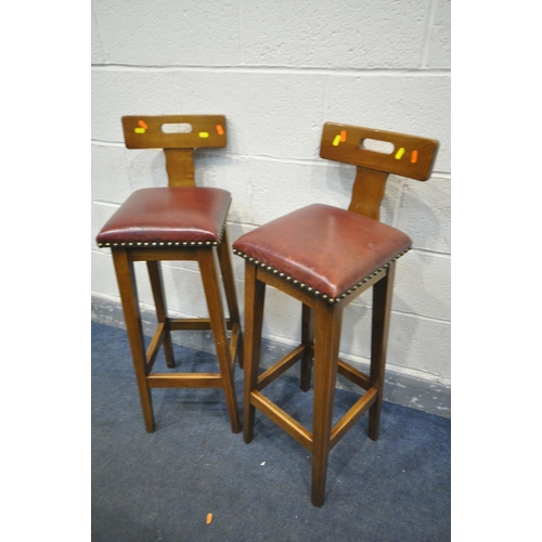 1412 - A MID 20TH CENTURY OAK LINENFOLD BAR, the top with wine glass holders, four shelves with turned supp... 