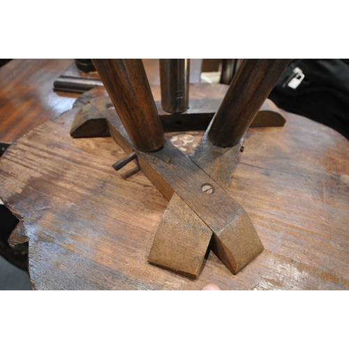 1413 - A 19TH CENTURY ANGLO INDIAN HEAVILY CARVED PADOUK OCCASIONAL TABLE, the top with foliate detail surr... 