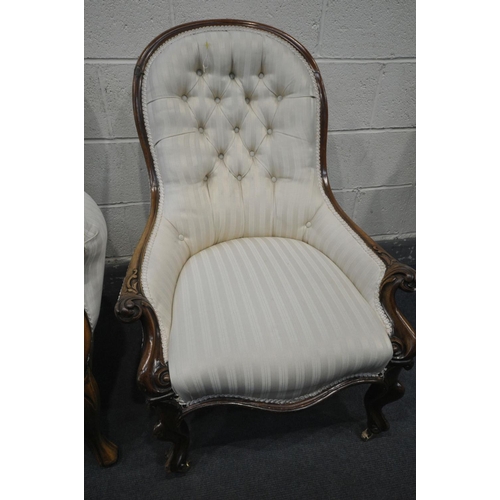 1415 - A VICTORIAN WALNUT BUTTONED SPOON BACK ARMCHAIR, with cream stripped upholstery, on ball and claw fr... 