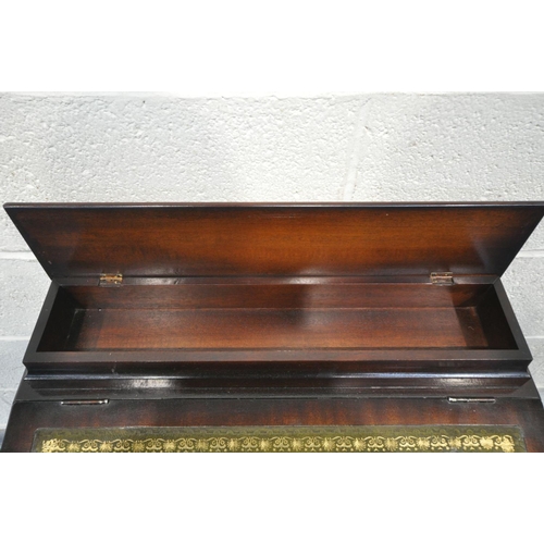 1416 - A REPRODUCITON MAHOGANY DAVENPORT, with raised back, a green tooled leather inlay, on turned support... 