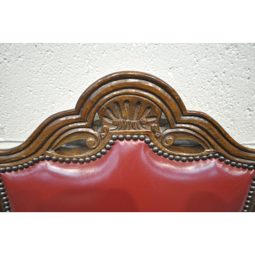 1425 - A PAIR OF REPRODUCTION VICTORIAN STYLE CARVER CHAIRS, with red leather upholstery, carved open armre... 