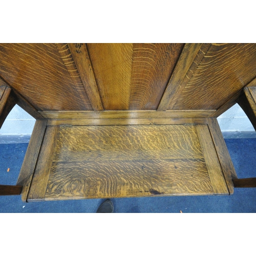 1426 - A 20TH CENTURY OAK HALL SETTLE, with open armrests, and a hinged lid storage compartment, labelled A... 