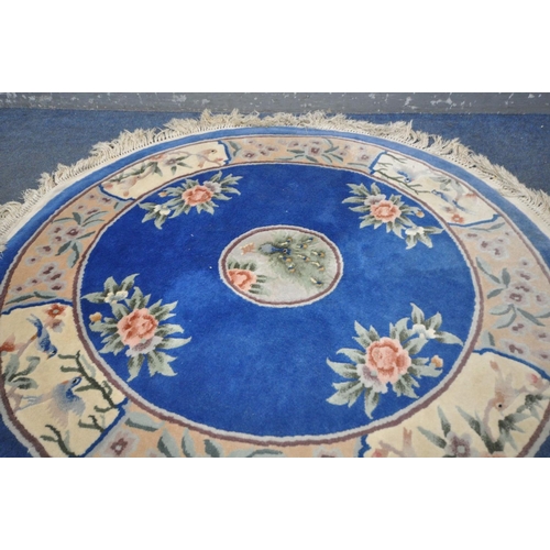 1439 - A WOOLLEN CHINESE CIRCULAR RUG, diameter 130cm