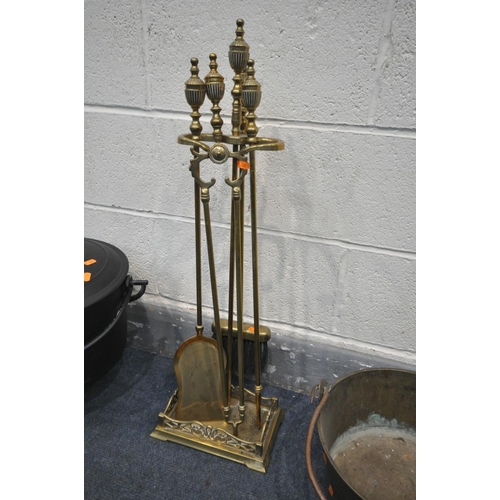 1440 - A BRASS FOUR PIECE COMPANION SET, with stand, along with a chappee cast iron cauldron, a brass jam p... 