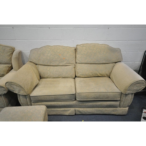 1443 - A BEIGE UPHOLSTERED LOUNGE SUITE, comprising a two seater sofa, length 198cm, a pair of armchairs, a... 