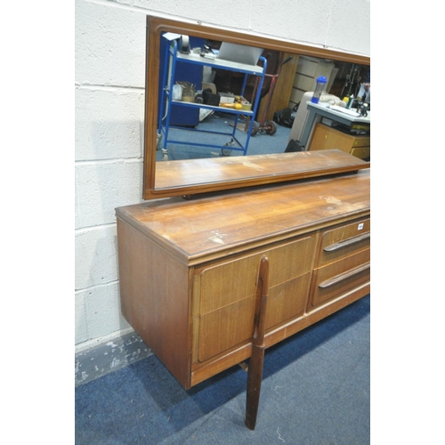 1444 - A MID CENTURY WRIGHTON TEAK DRESSING TABLE, with a single rectangular mirror, and six drawers, width... 