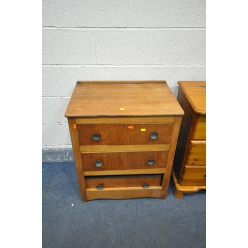 1452 - A PINE THREE DRAWER BEDSIDE CABINET, along with a pine hi-fi cabinet, two drawer cd cabinet containi... 