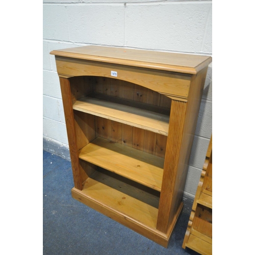 1470 - A PINE OPEN BOOKCASE with two adjustable shelves, width 76cm x depth 33cm x height 107cm, a pitch pi... 