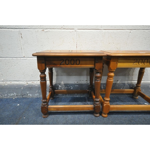 1472 - A PAIR OF SIMPSONS OF NORFOLK CHERRYWOOD AND CROSSBANDED MILLENNIUM STOOLS, the with a carved cross ... 