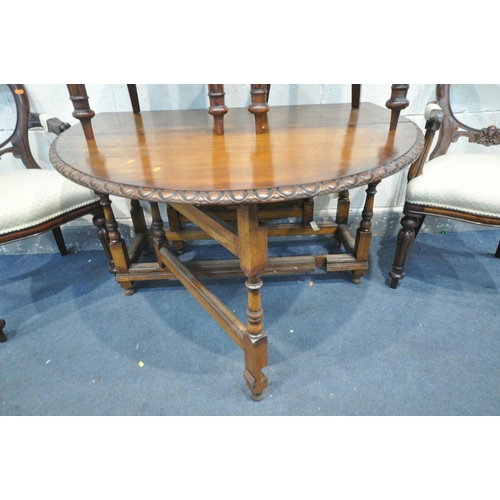 1477 - A REPRODUCTION OAK GATE LEG TABLE, open length 156cm x closed length 44cm x depth 123cm, height 70cm... 