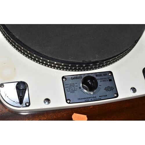 441 - A GARRARD 301 TRANSCRIPTION TURNTABLE, Schedule No 51400/2, Serial No 58451 mounted to a recent plin... 