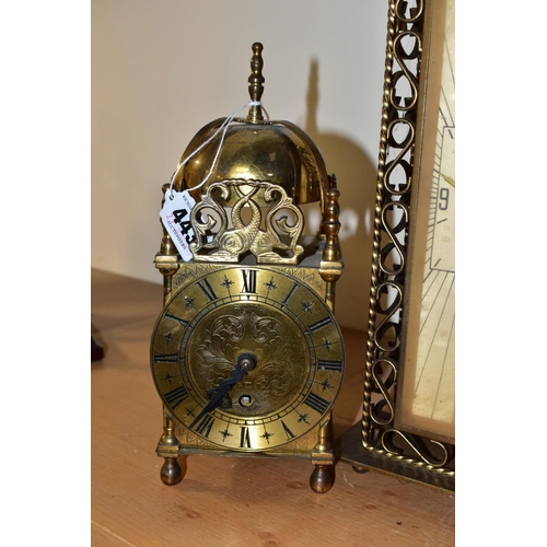 443 - TWO MID 20TH CENTURY CLOCKS, comprising a Smiths brass cased lantern clock with Roman numerals, dial... 