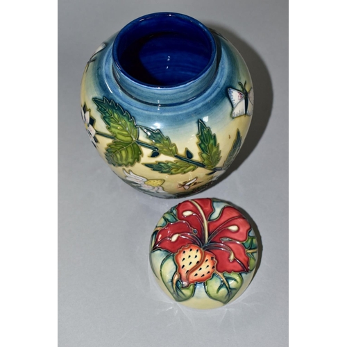 446 - A MOORCROFT FRUIT GARDEN GINGER JAR WITH SIMEON PATTERN LID, featuring tubelined flowers, strawberri... 