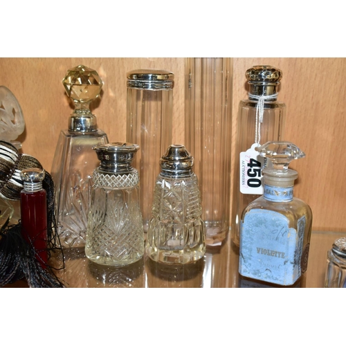 450 - A COLLECTION OF MAINLY EARLY 20TH CENTURY GLASS SCENT BOTTLES AND SIMILAR ITEMS, many with silver li... 