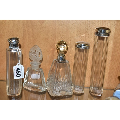 450 - A COLLECTION OF MAINLY EARLY 20TH CENTURY GLASS SCENT BOTTLES AND SIMILAR ITEMS, many with silver li... 