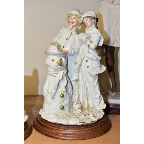 460 - FIVE CAPODIMONTE RESIN FIGURES AND GROUPS IN WHITE, highlighted with flesh tones, including a Guisep... 